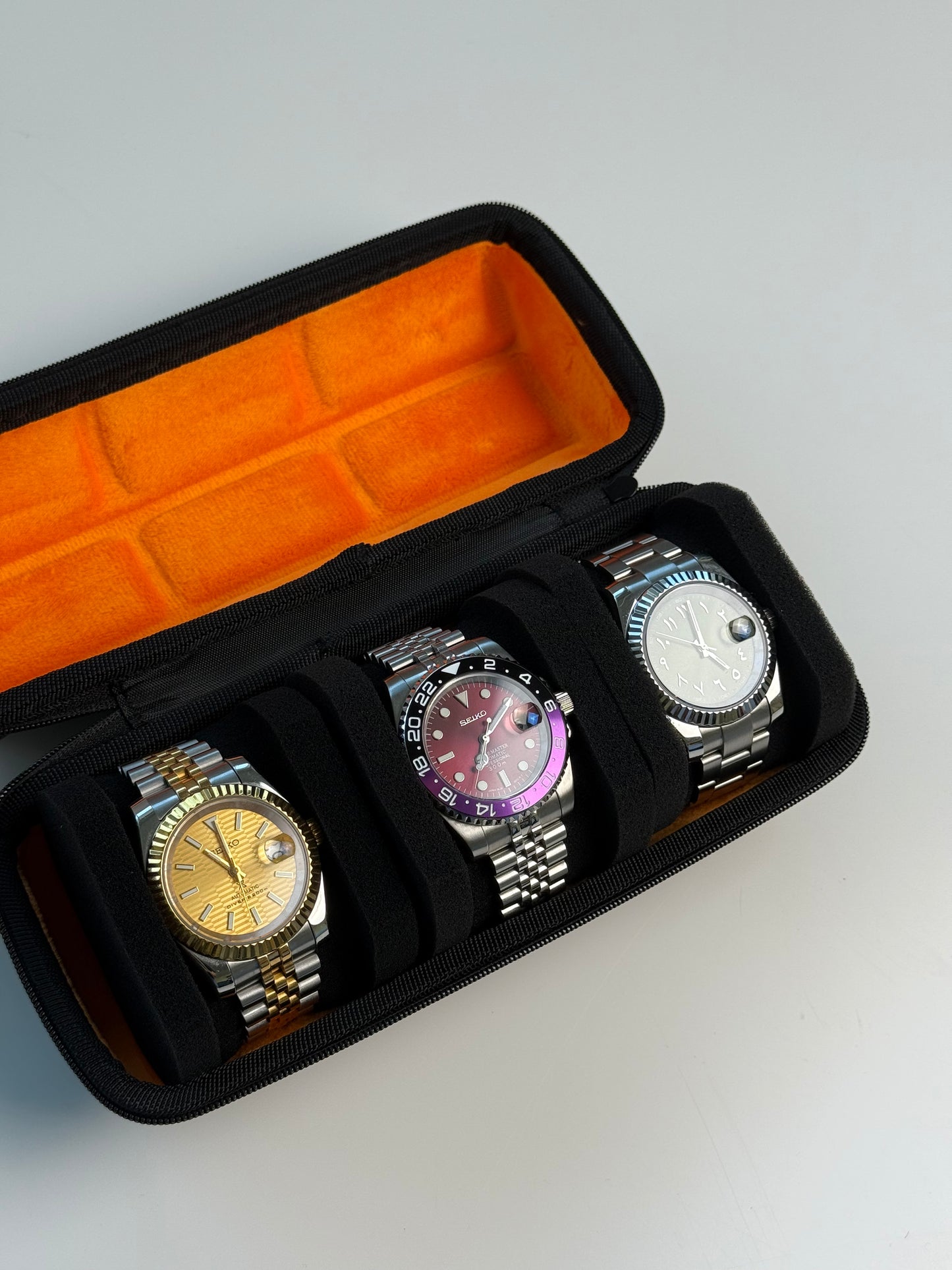 Boîte de voyage rigide pour 3 montres – Étui noir avec intérieur velours orange