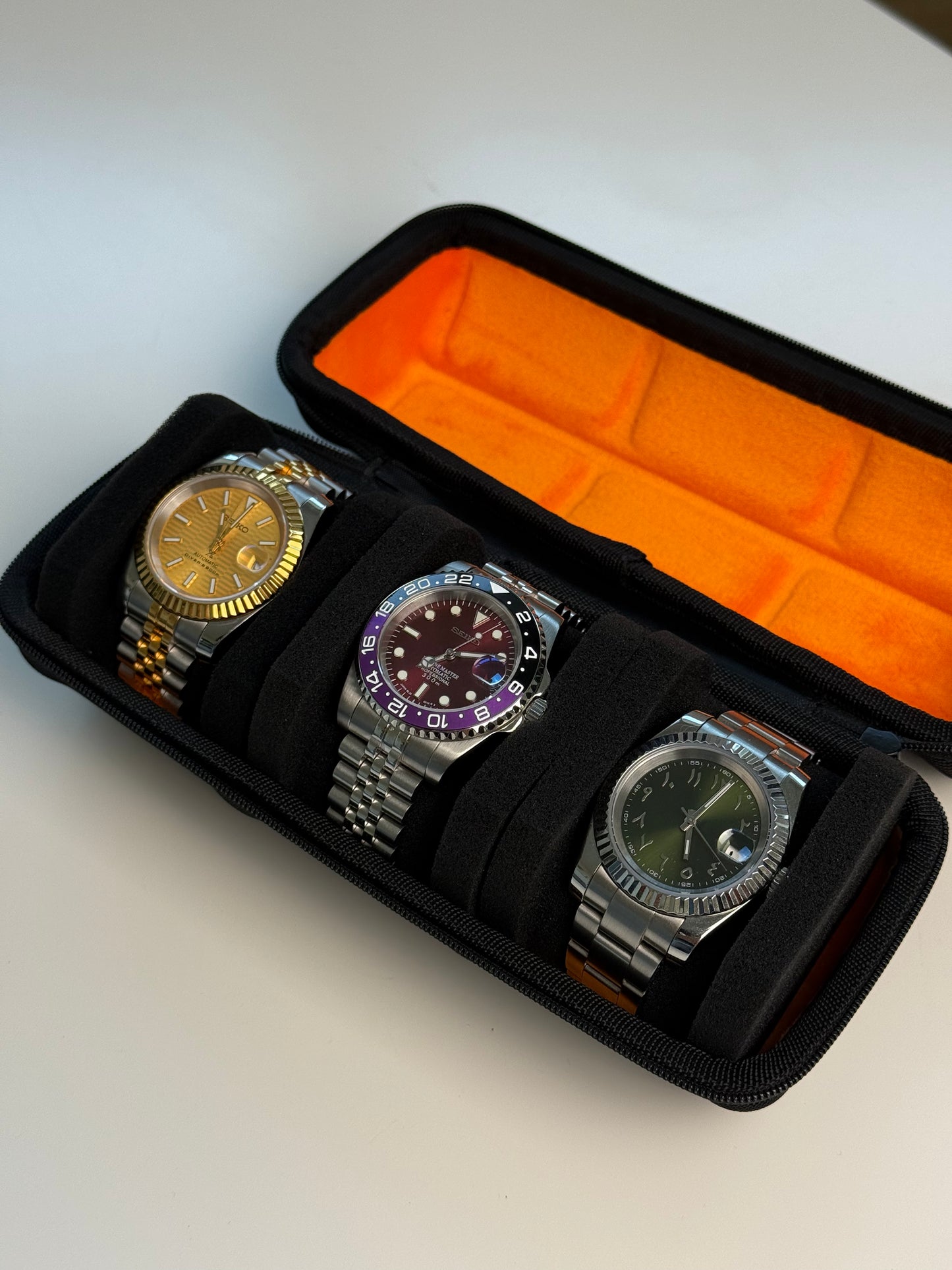 Boîte de voyage rigide pour 3 montres – Étui noir avec intérieur velours orange